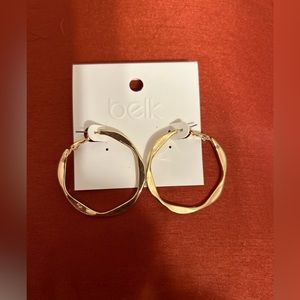 Angular hoop earrings.